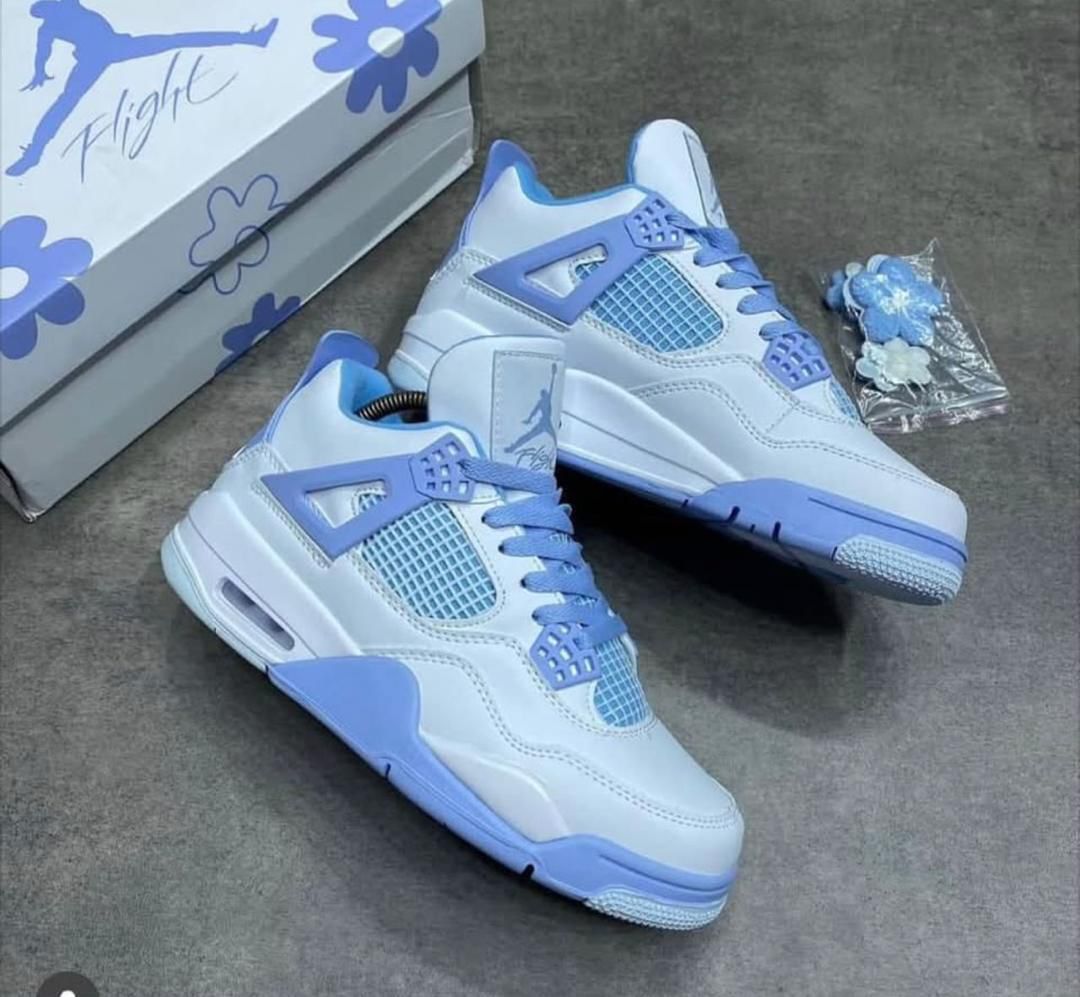 img-20260425-wa0041-ifzhxM.jpg Air Jordan 4 Retro 'University Blue' - White and Blue Floral Sneakers - Image 1