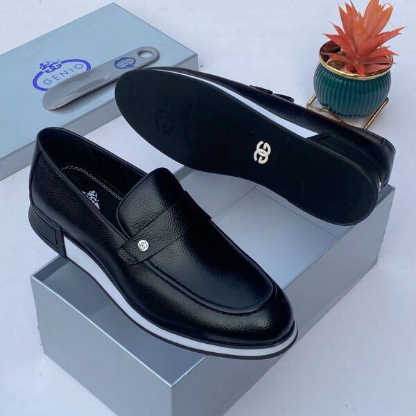 Black Leather Loafers with White Sole and Silver Logo